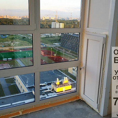 Замена фасадного остекления балкона ЖК Новоорловский в СПб